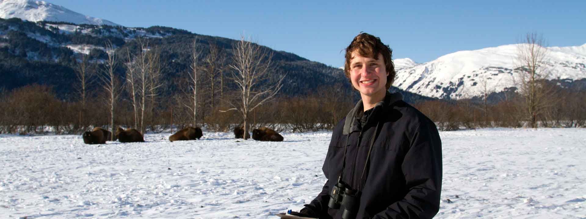 51 student Luke Rogers studying bison